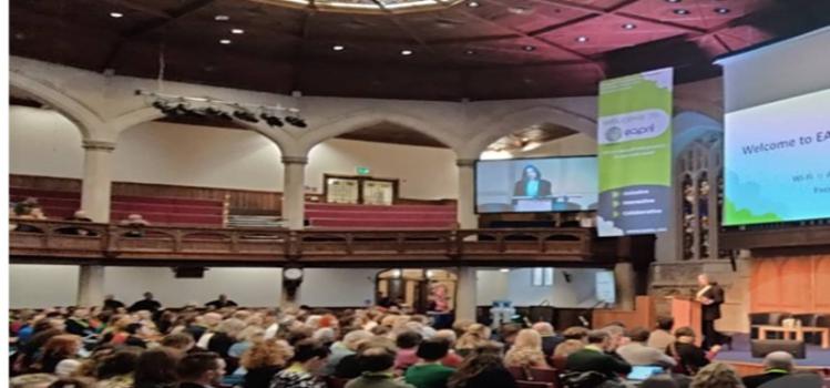 people seated at conference